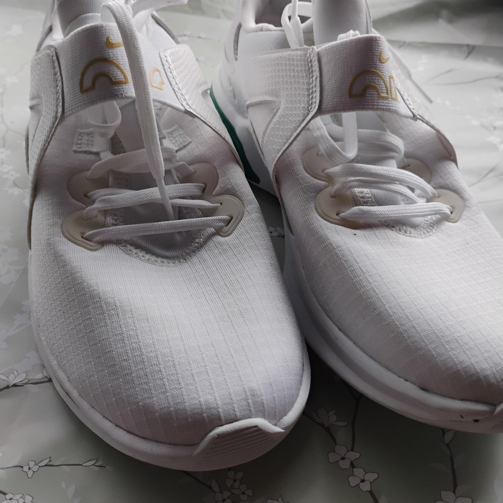Nike White Sneakers with Subtle Gold Details